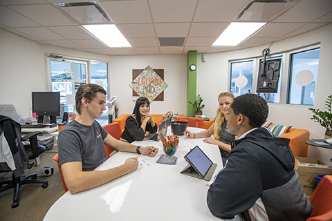 Students talking to staff at the Launchpad